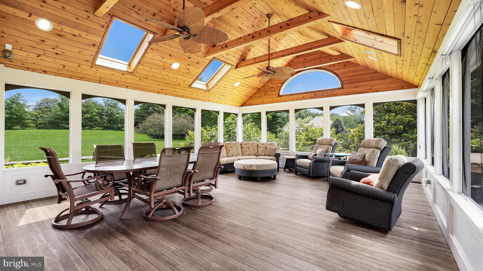340 West Sandy Ridge Road Doylestown, PA 18901 - Photo 14 of 40 a view of a patio with dining table and chairs