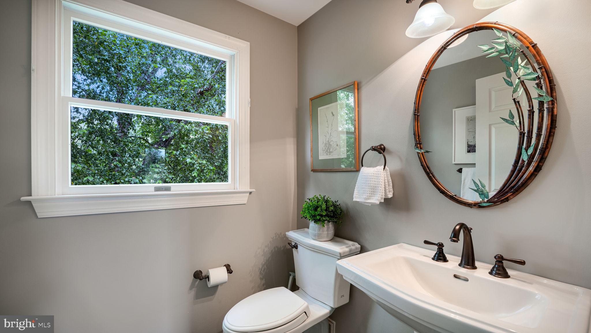 340 West Sandy Ridge Road Doylestown, PA 18901 - Photo 16 of 40 a bathroom with a toilet sink and mirror
