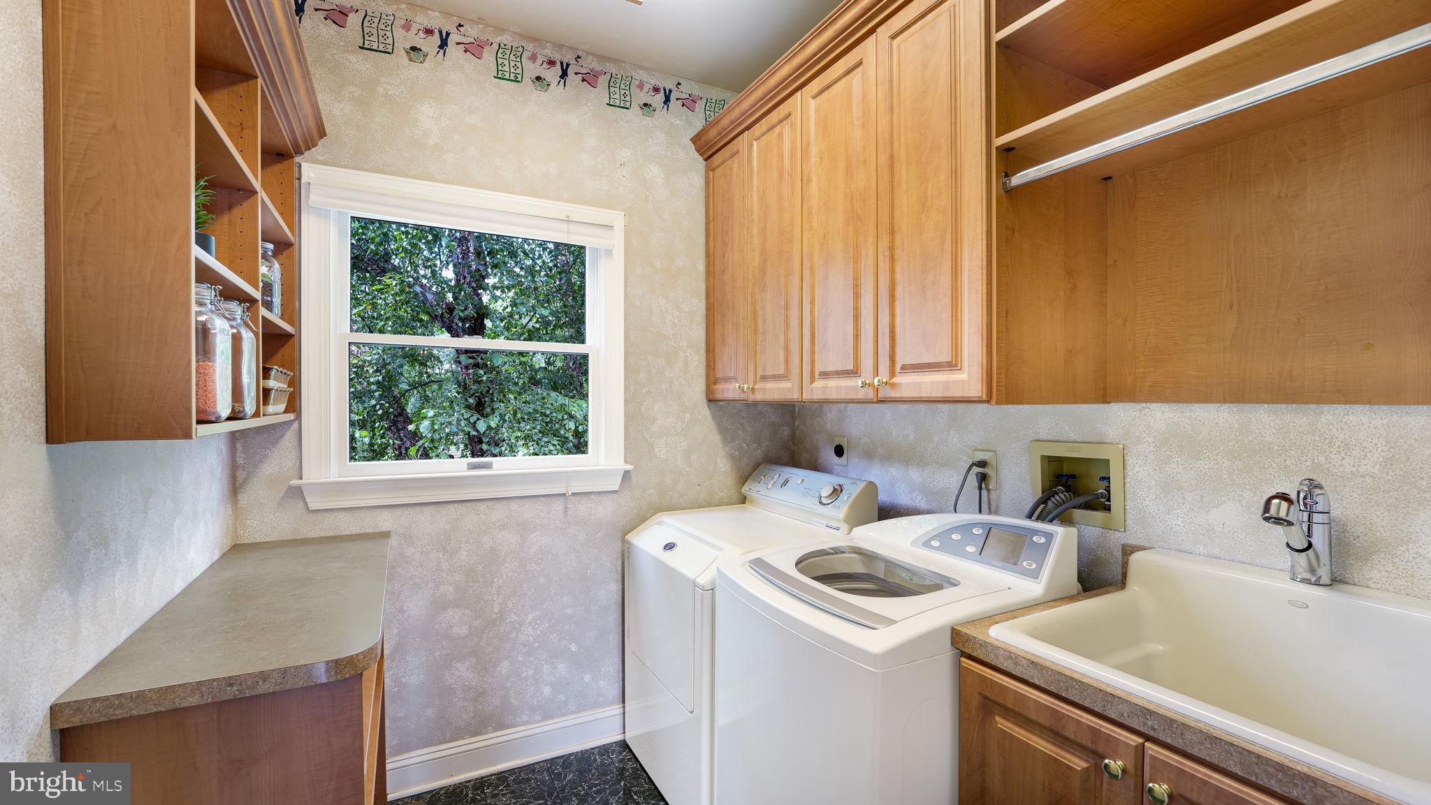 340 West Sandy Ridge Road Doylestown, PA 18901 - Photo 17 of 40 a view of storage and utility room with washer and dryer