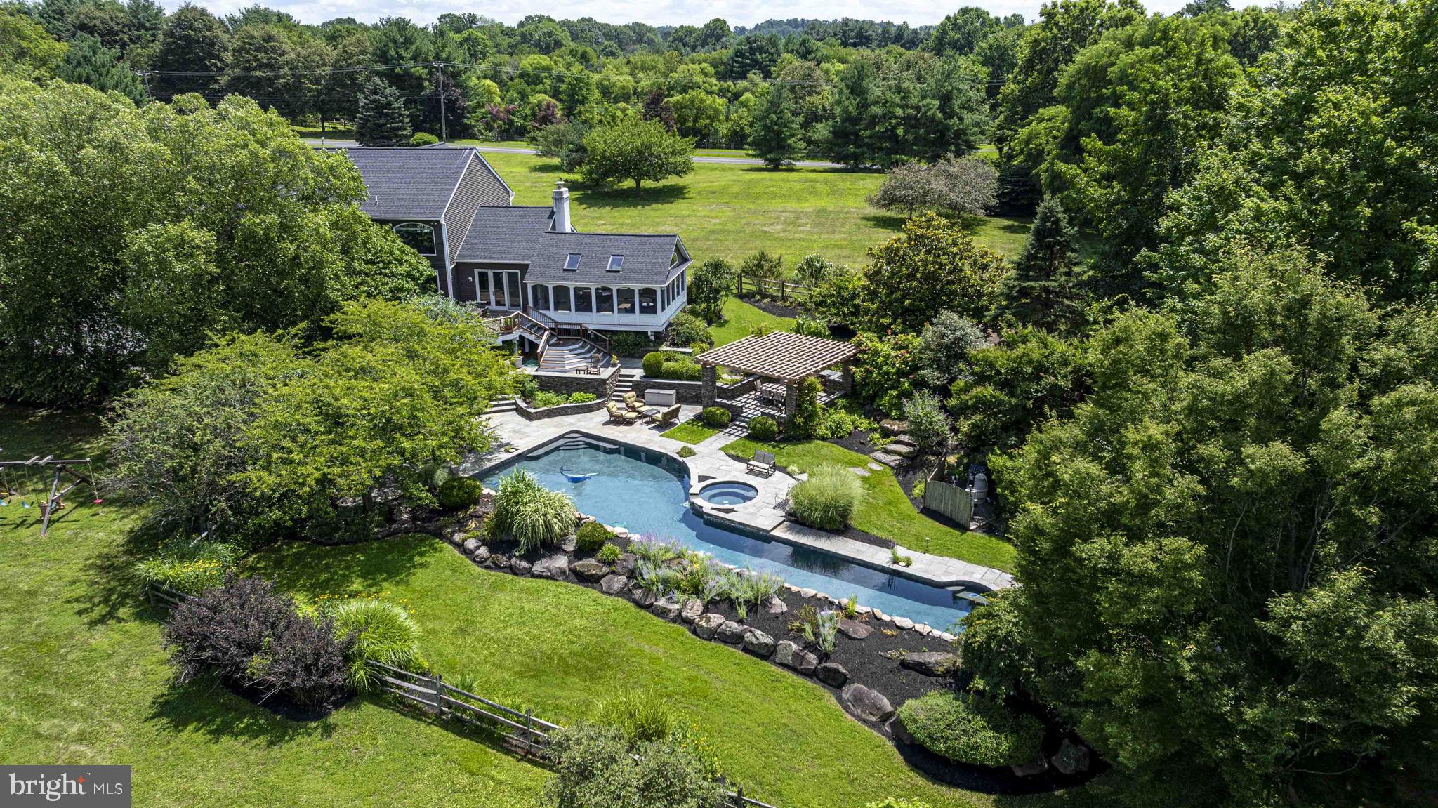 340 West Sandy Ridge Road Doylestown, PA 18901 - Photo 2 of 40 an aerial view of a house with a garden