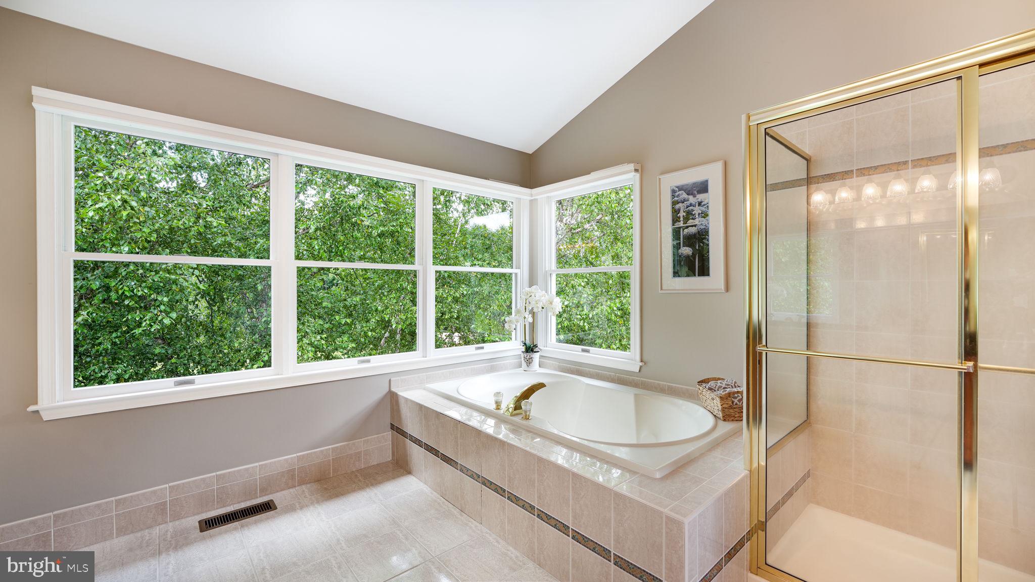 340 West Sandy Ridge Road Doylestown, PA 18901 - Photo 21 of 40 a bathroom with a tub a sink and a window