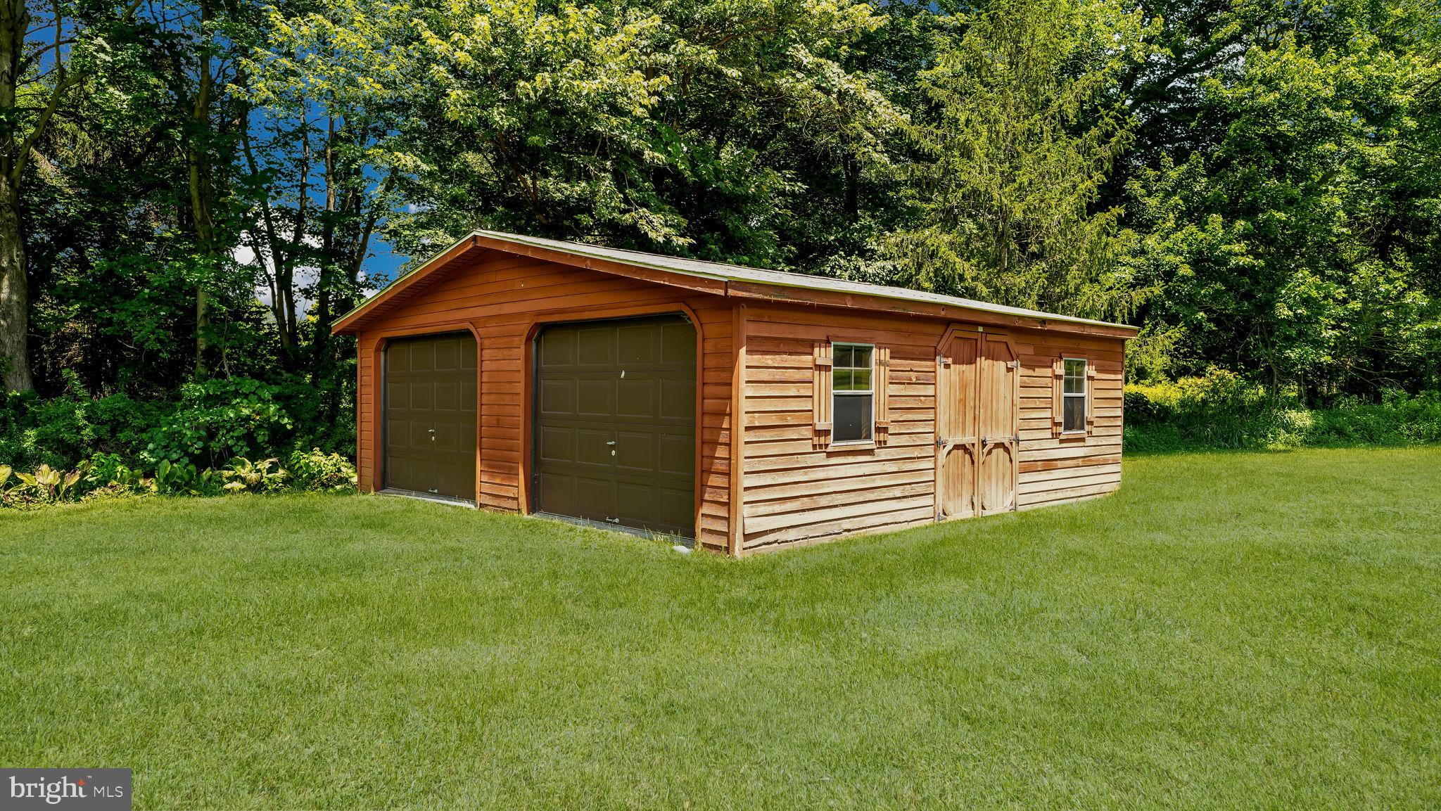 340 West Sandy Ridge Road Doylestown, PA 18901 - Photo 39 of 40 a front view of a house with a garden