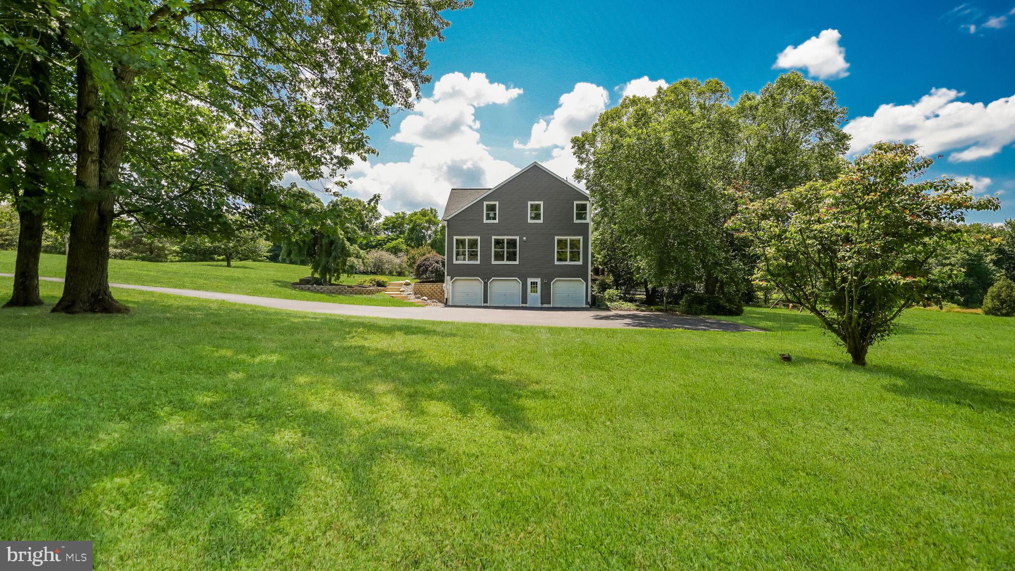 340 West Sandy Ridge Road Doylestown, PA 18901 - Photo 40 of 40 a front view of a house with a big yard