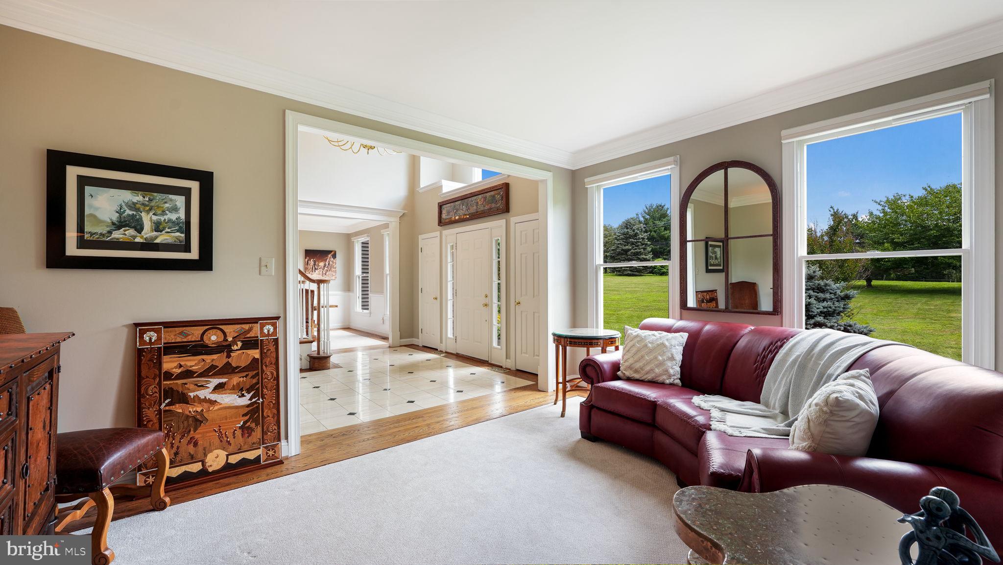 340 West Sandy Ridge Road Doylestown, PA 18901 - Photo 6 of 40 a living room with furniture and a large window