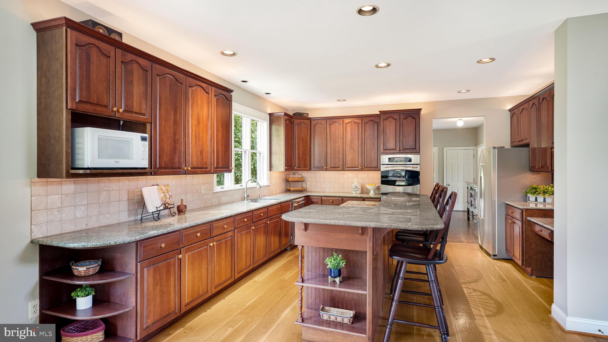 340 West Sandy Ridge Road Doylestown, PA 18901 - Photo 9 of 40 a kitchen with stainless steel appliances sink microwave and stove