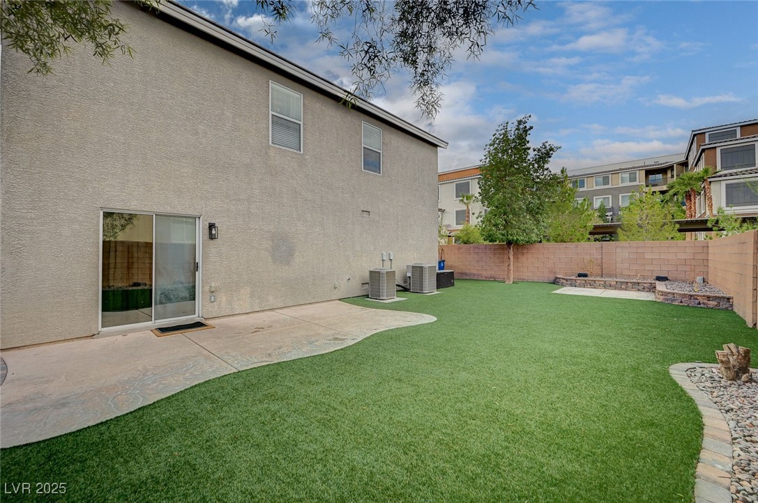 9310 Pinarello Street Las Vegas, NV 89178 - Photo 53 of 61 Fenced backyard featuring a patio