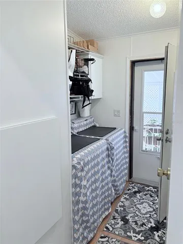 a view of a backyard with furniture