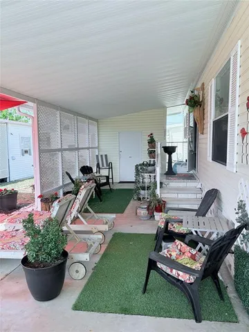 a view of a terrace with chairs