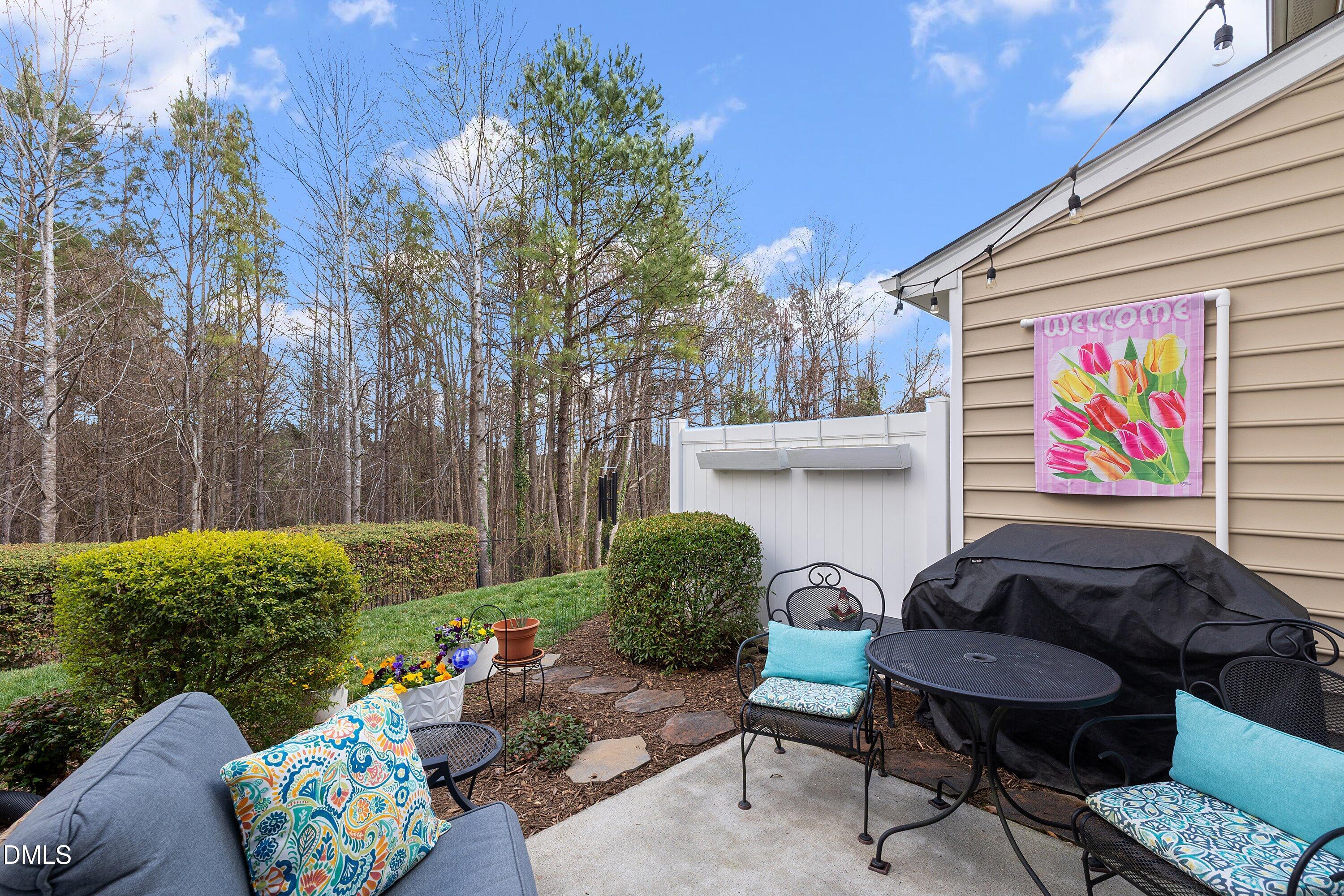 1093 Renewal Place Raleigh, NC 27603 - Photo 31 of 45 a outdoor living space with furniture and garden view