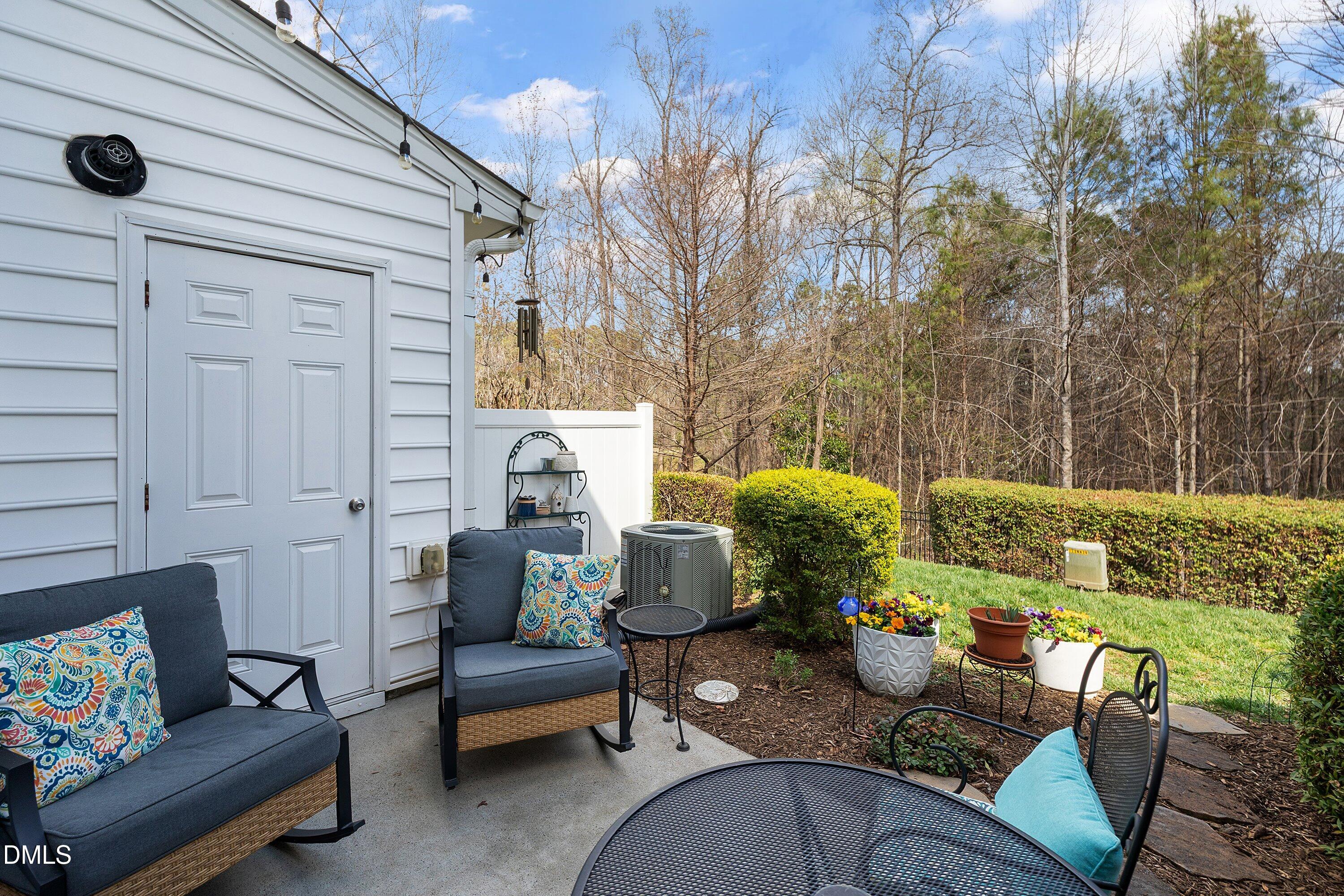 1093 Renewal Place Raleigh, NC 27603 - Photo 33 of 45 a backyard of a house with outdoor seating