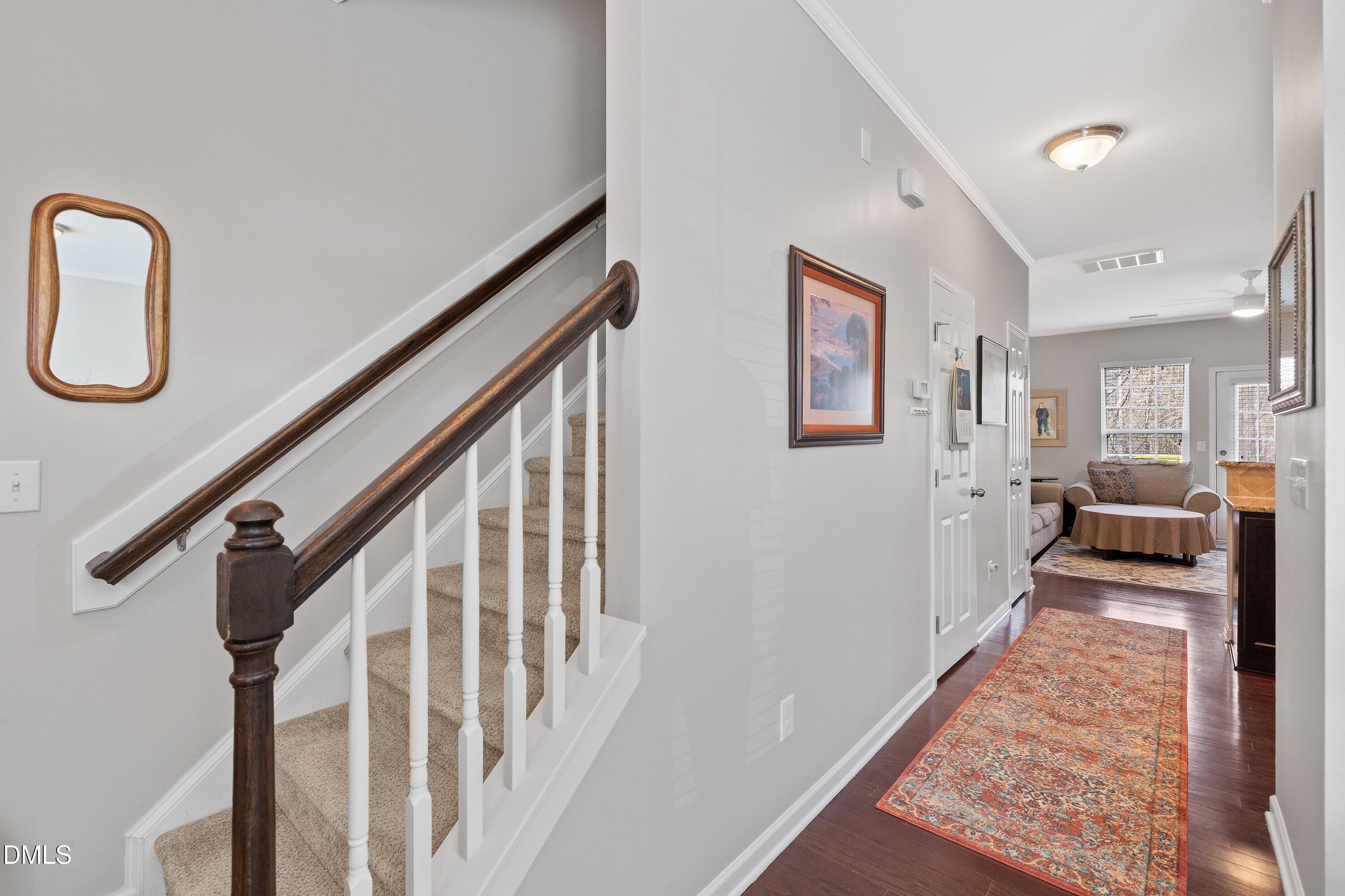 1093 Renewal Place Raleigh, NC 27603 - Photo 6 of 45 a view of an entryway with wooden floor
