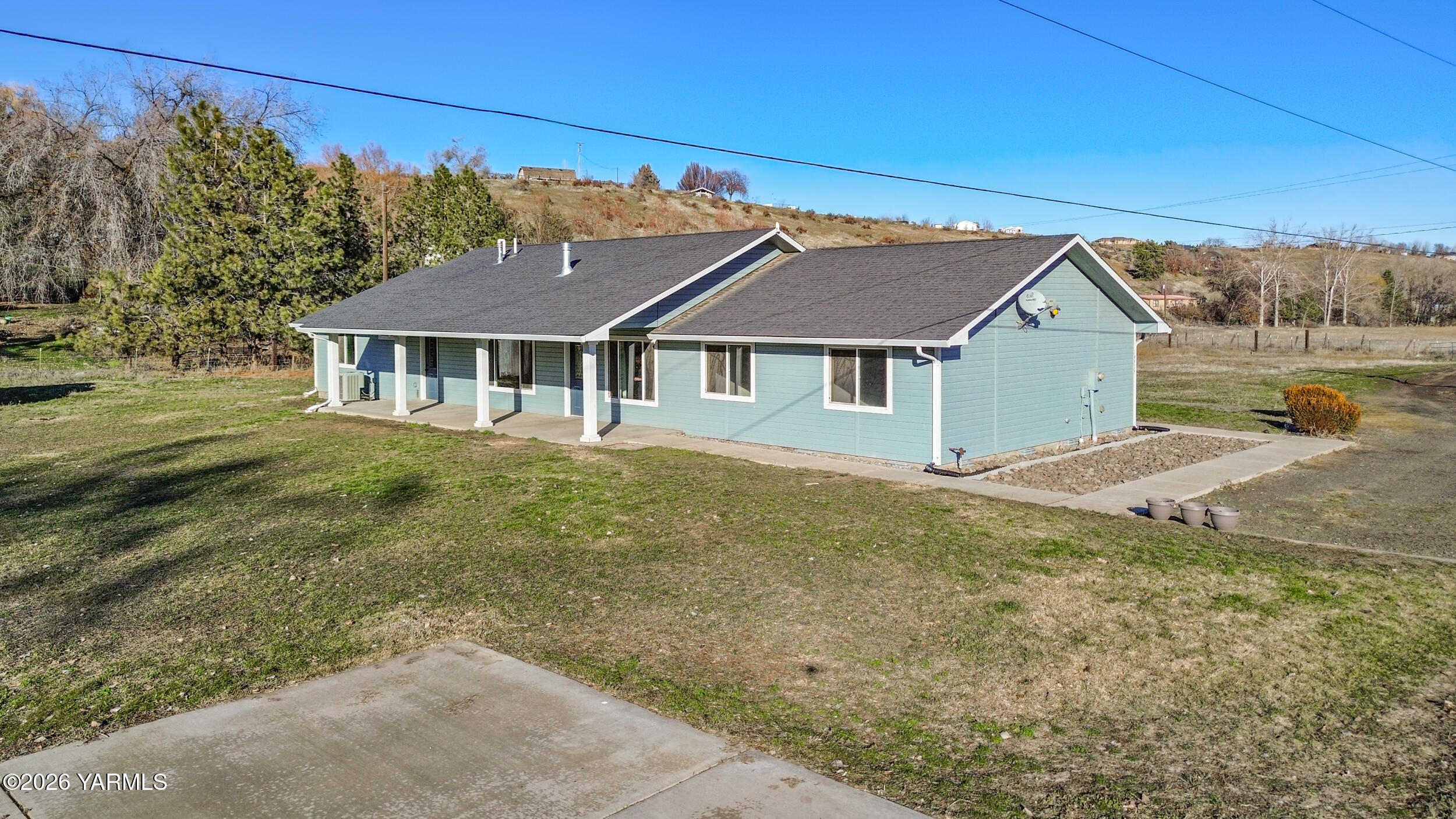 14929 Cottonwood Canyon Road Yakima, WA 98908 - Photo 1 of 55 front view of a house with a yard