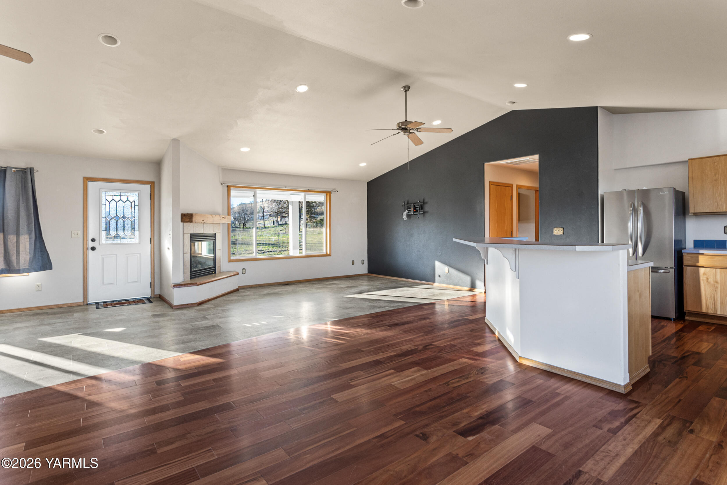 14929 Cottonwood Canyon Road Yakima, WA 98908 - Photo 17 of 55 a view of a kitchen with a sink and a refrigerator