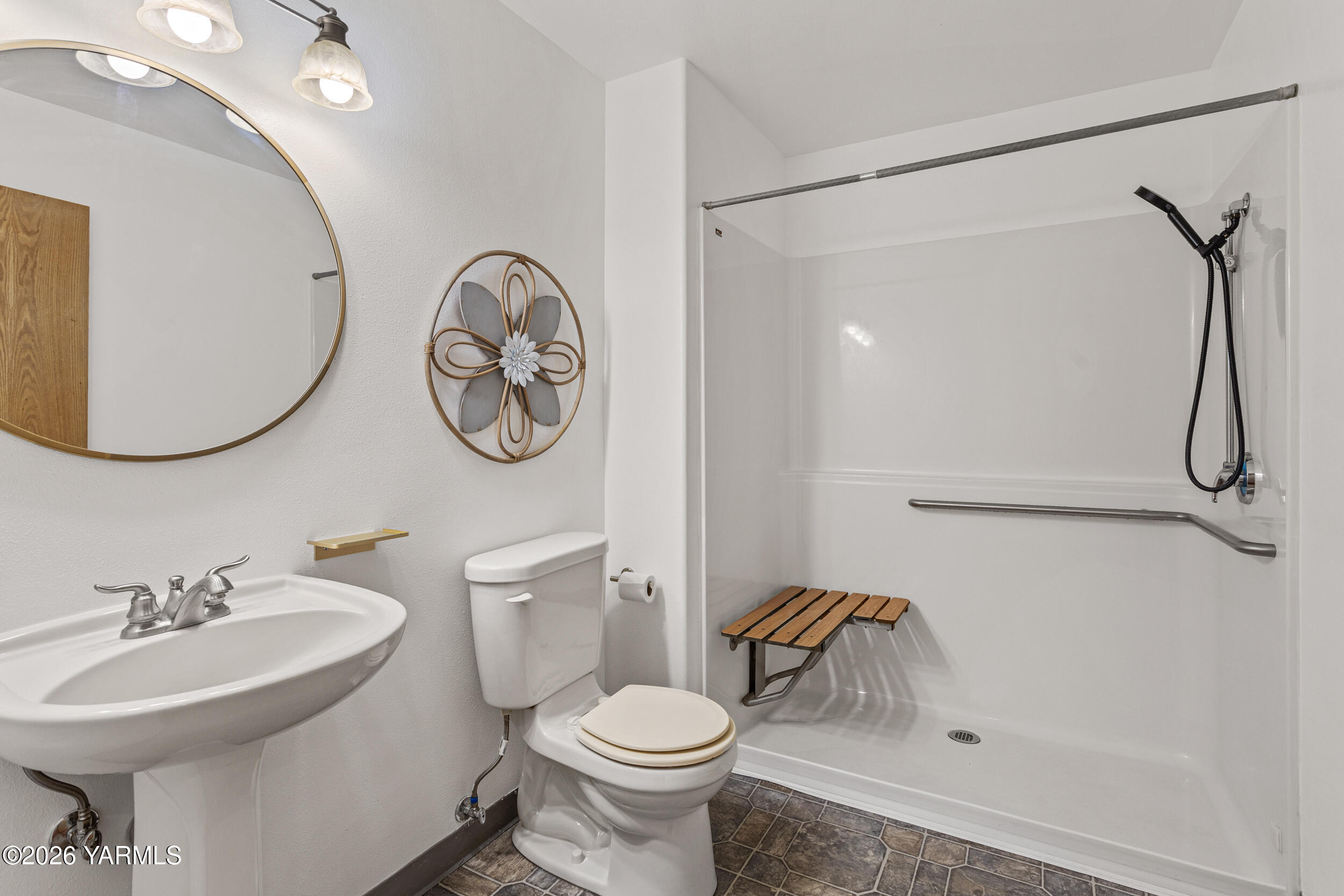 14929 Cottonwood Canyon Road Yakima, WA 98908 - Photo 32 of 55 a bathroom with a toilet sink and a mirror