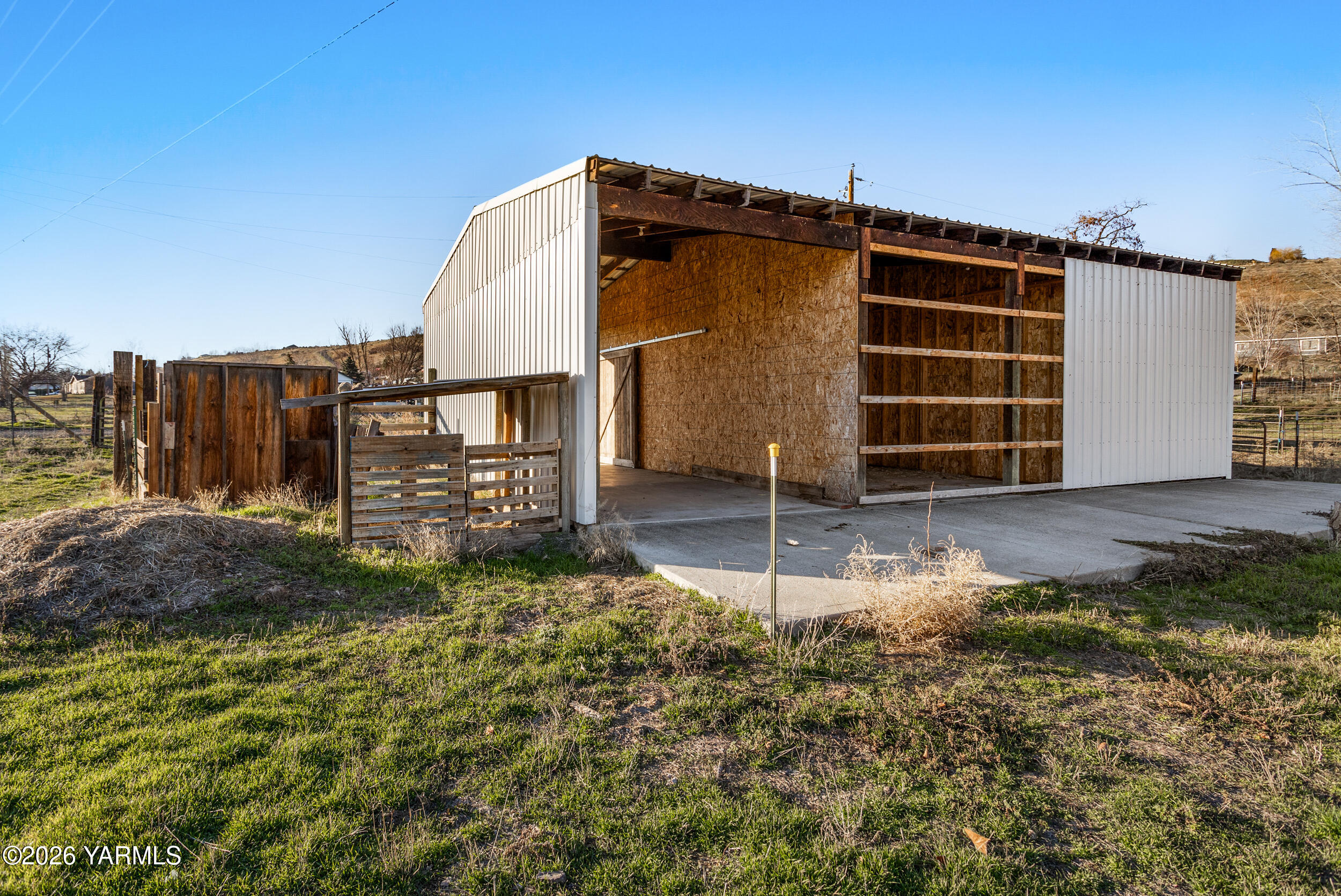 14929 Cottonwood Canyon Road Yakima, WA 98908 - Photo 48 of 55 a view of a house with a yard