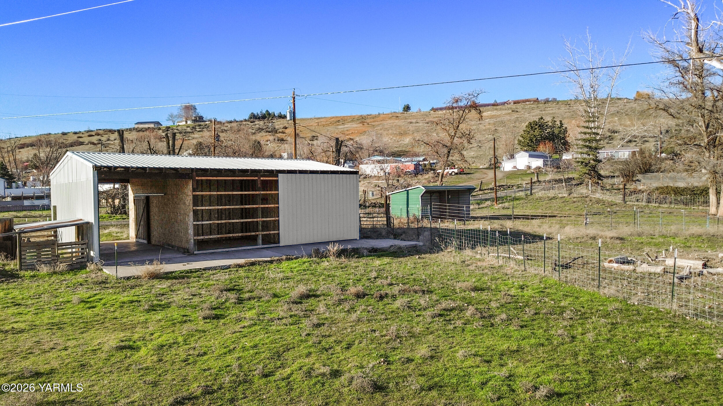 14929 Cottonwood Canyon Road Yakima, WA 98908 - Photo 49 of 55 a view of a house with a yard