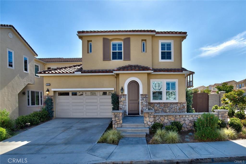 3929 Somerset Road Yorba Linda, CA 92886 - Photo 1 of 5 a front view of a house with a yard