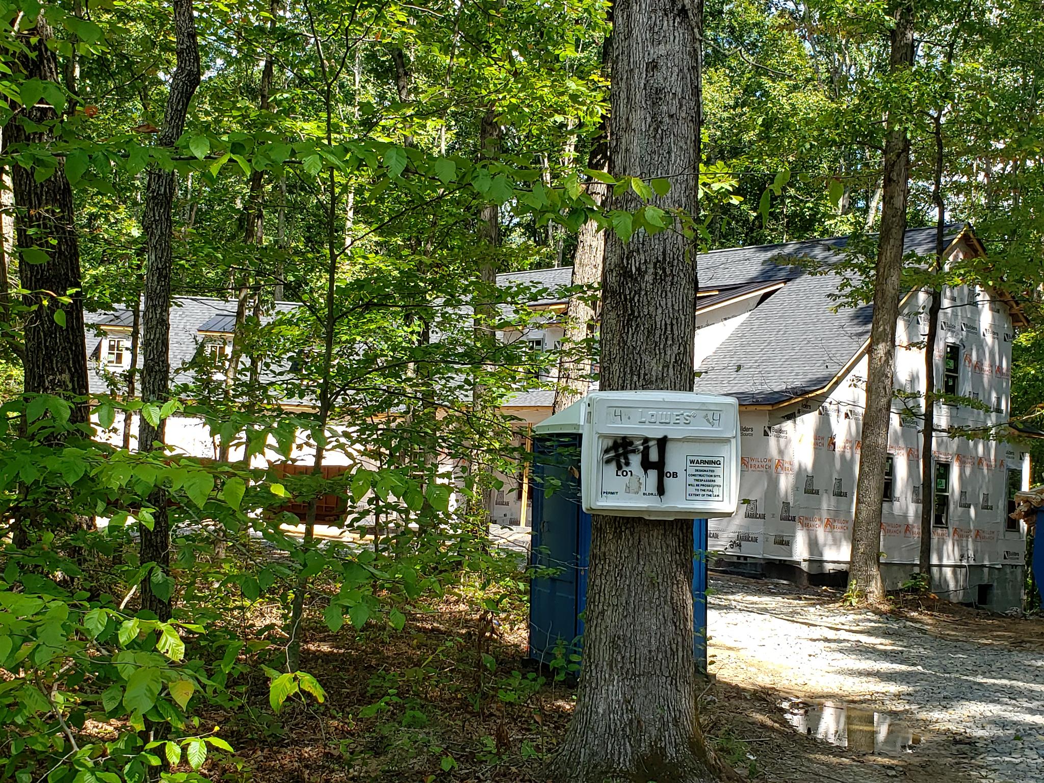5904 Pinewood Road Franklin, TN 37064 - Photo 24 of 24 a front view of a house with a garden and tree