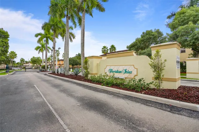 a view of a street with a building in the background