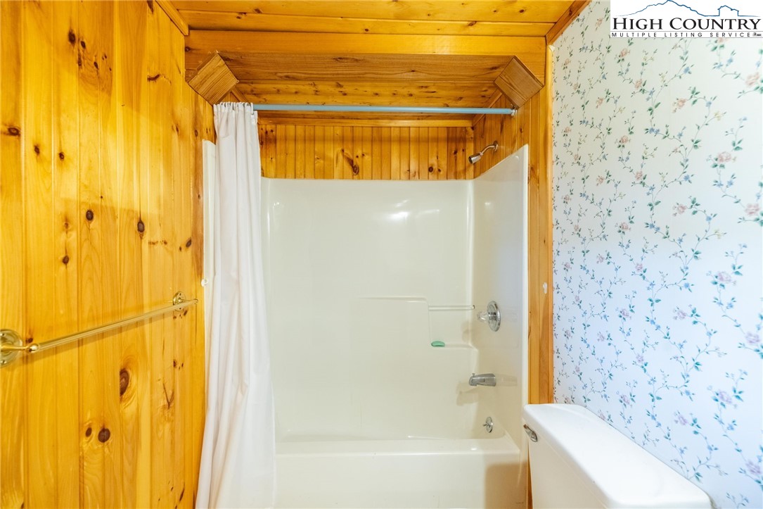 45 Bailey Road Ennice, NC 28623 - Photo 17 of 48 a bathroom with a shower