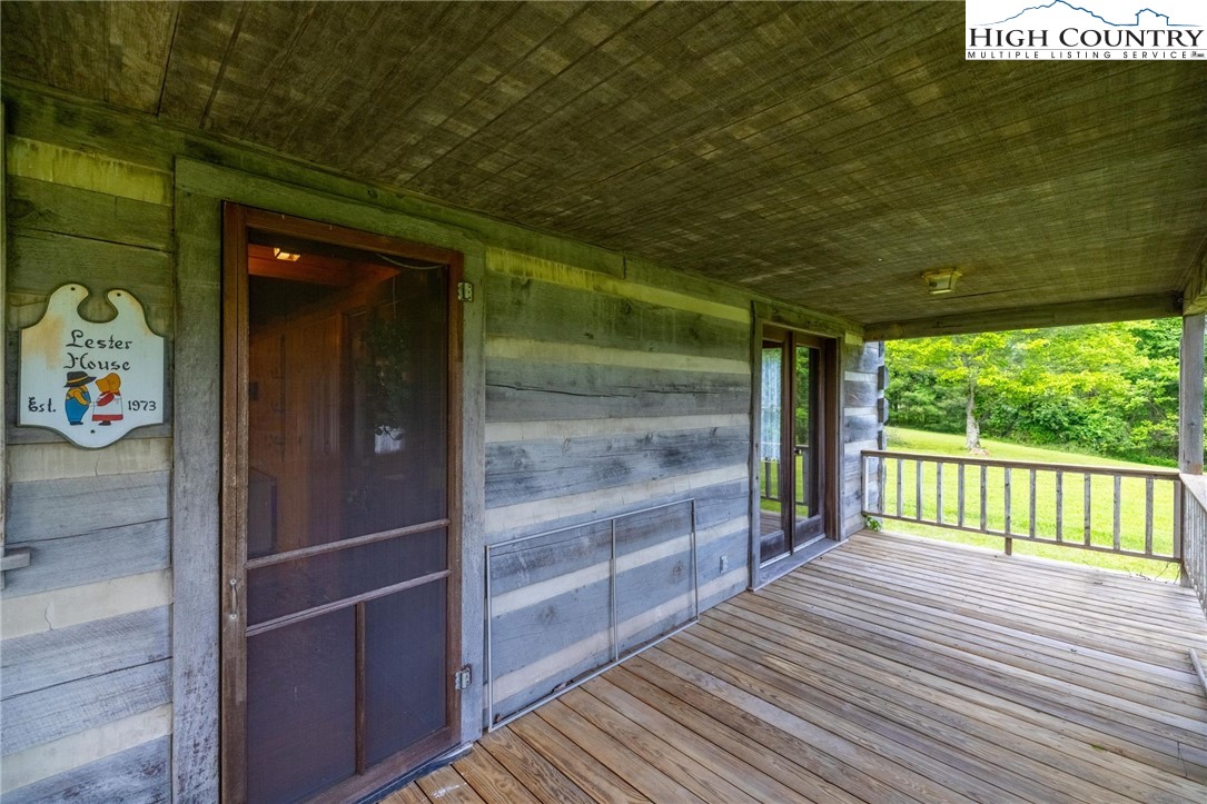 45 Bailey Road Ennice, NC 28623 - Photo 45 of 48 a view of a porch with wooden floor
