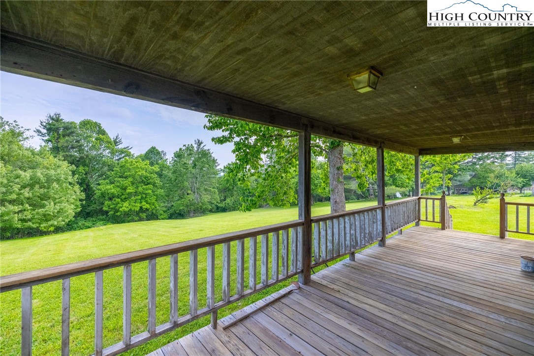 45 Bailey Road Ennice, NC 28623 - Photo 46 of 48 a view of balcony with wooden floor