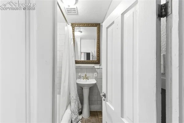 a bathroom with a toilet and a sink