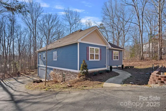 a front view of a house with yard