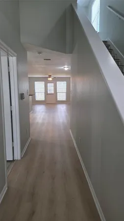 a bathroom with a bathtub and a toilet