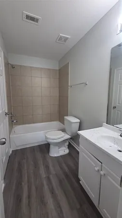 a bathroom with a sink and a toilet