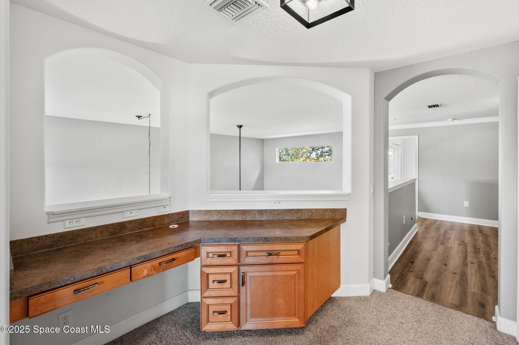 3126 Arden Circle Melbourne, FL 32934 - Photo 22 of 33 a view of cabinets