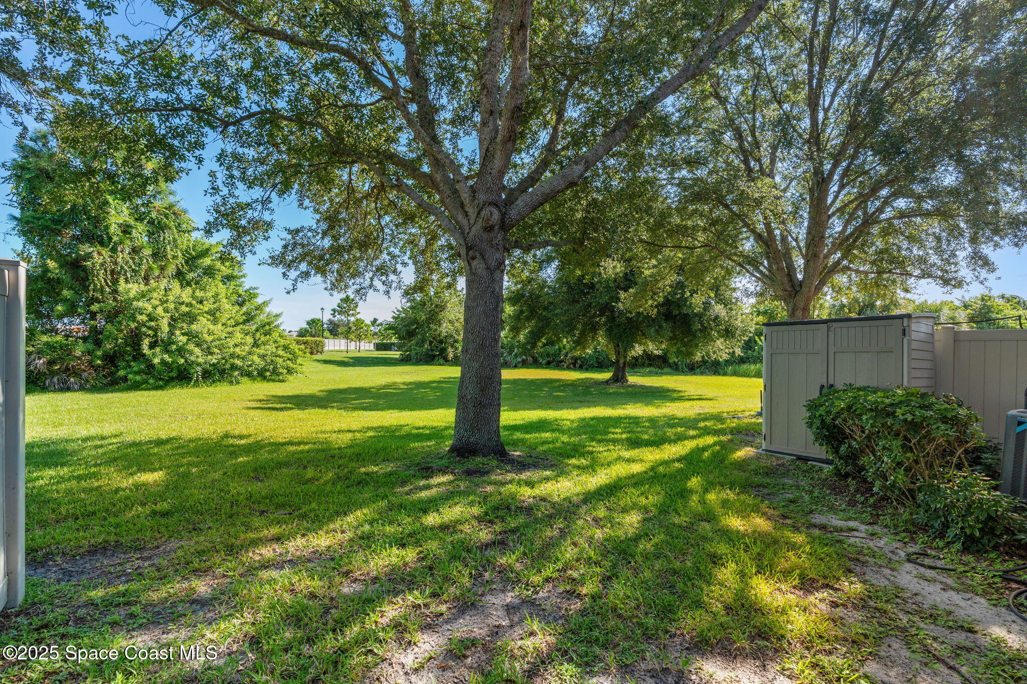 3126 Arden Circle Melbourne, FL 32934 - Photo 3 of 33 a view of a park with a tree