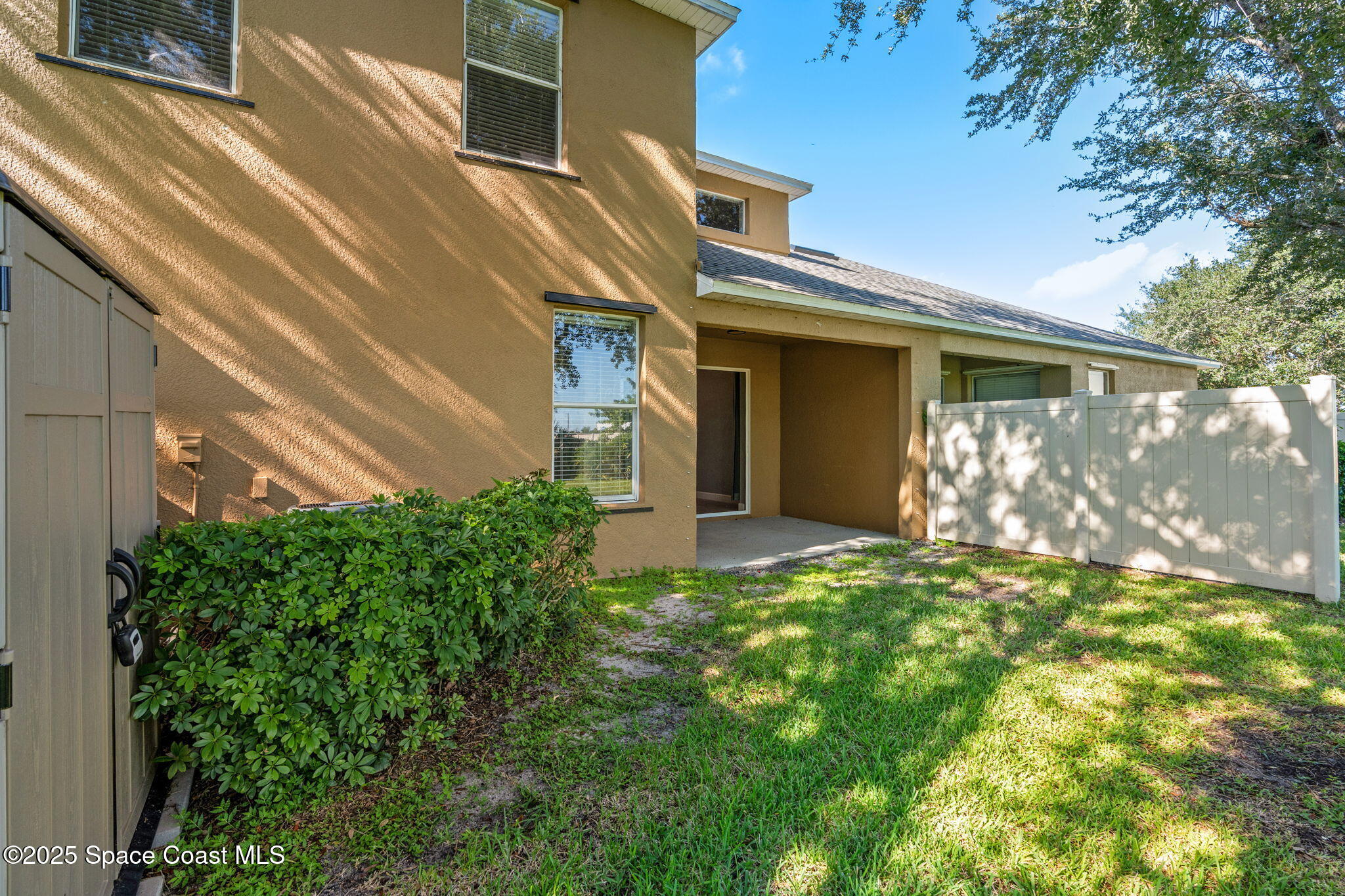 3126 Arden Circle Melbourne, FL 32934 - Photo 31 of 33 a view of a house with a yard