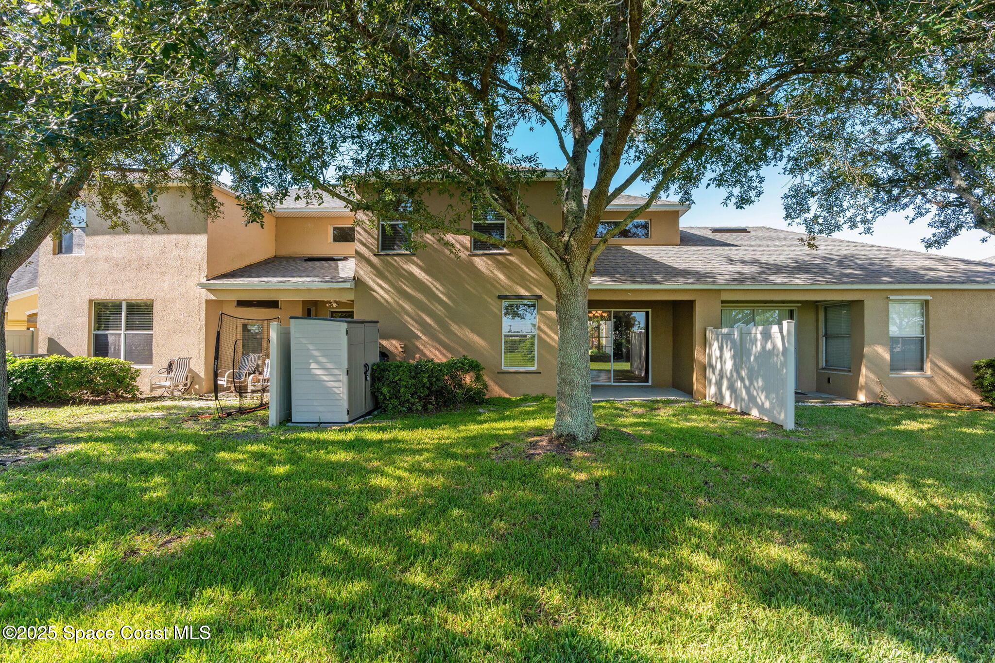 3126 Arden Circle Melbourne, FL 32934 - Photo 32 of 33 a view of a house with a yard