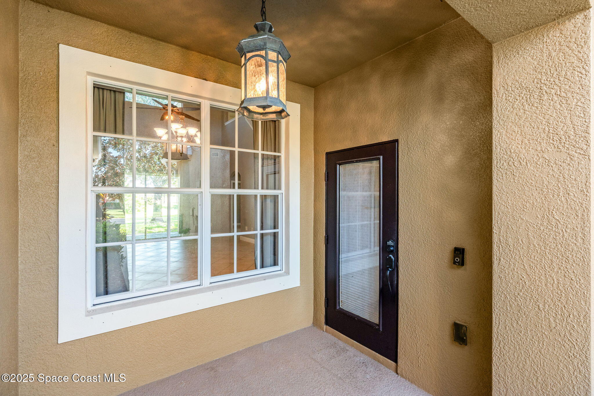 3126 Arden Circle Melbourne, FL 32934 - Photo 6 of 33 a view of empty room with windows