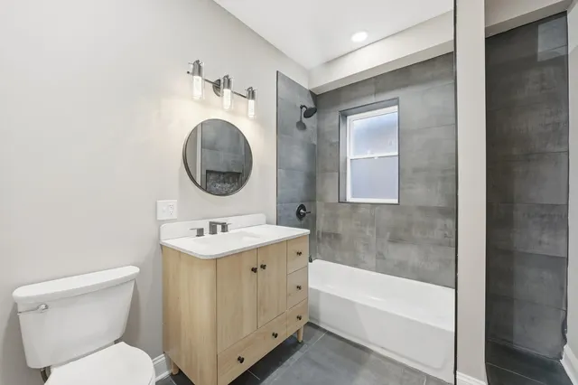 a bathroom with a sink toilet and a bathtub