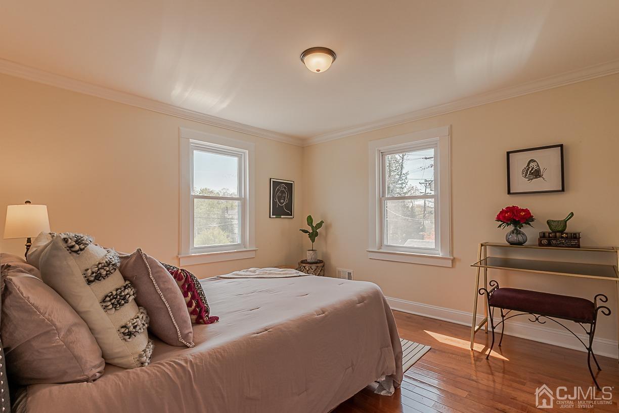 150 New Market Road Dunellen, NJ 08812 - Photo 16 of 22 a bed room with a bed and a window