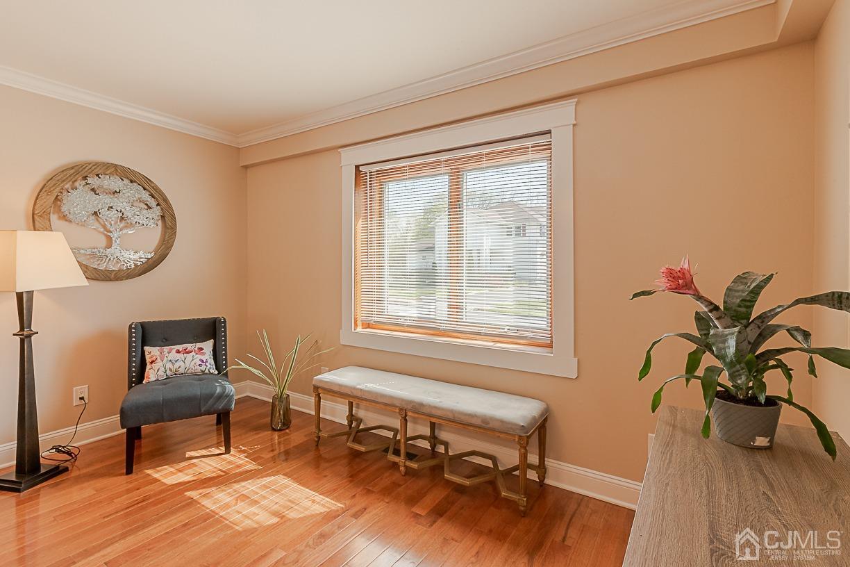 150 New Market Road Dunellen, NJ 08812 - Photo 4 of 22 a living room with furniture and a window