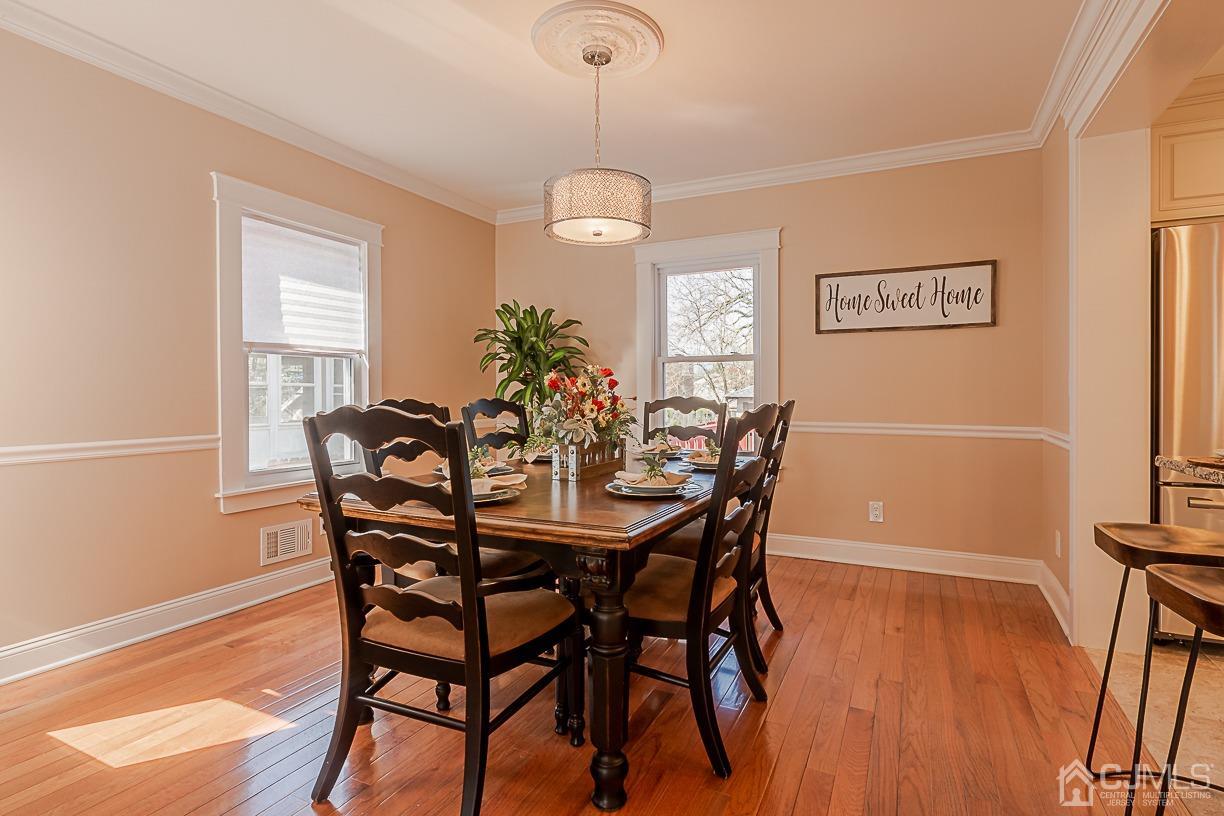 150 New Market Road Dunellen, NJ 08812 - Photo 6 of 22 a dining room with furniture and window