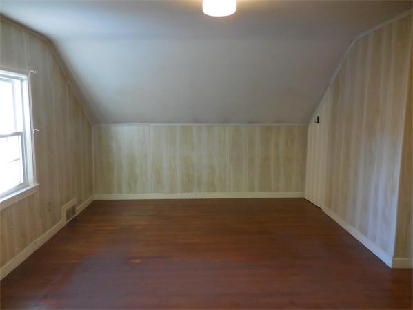 51 Pilgrim Road Springfield, MA 01118 - Photo 16 of 20 a view of an empty room with a window