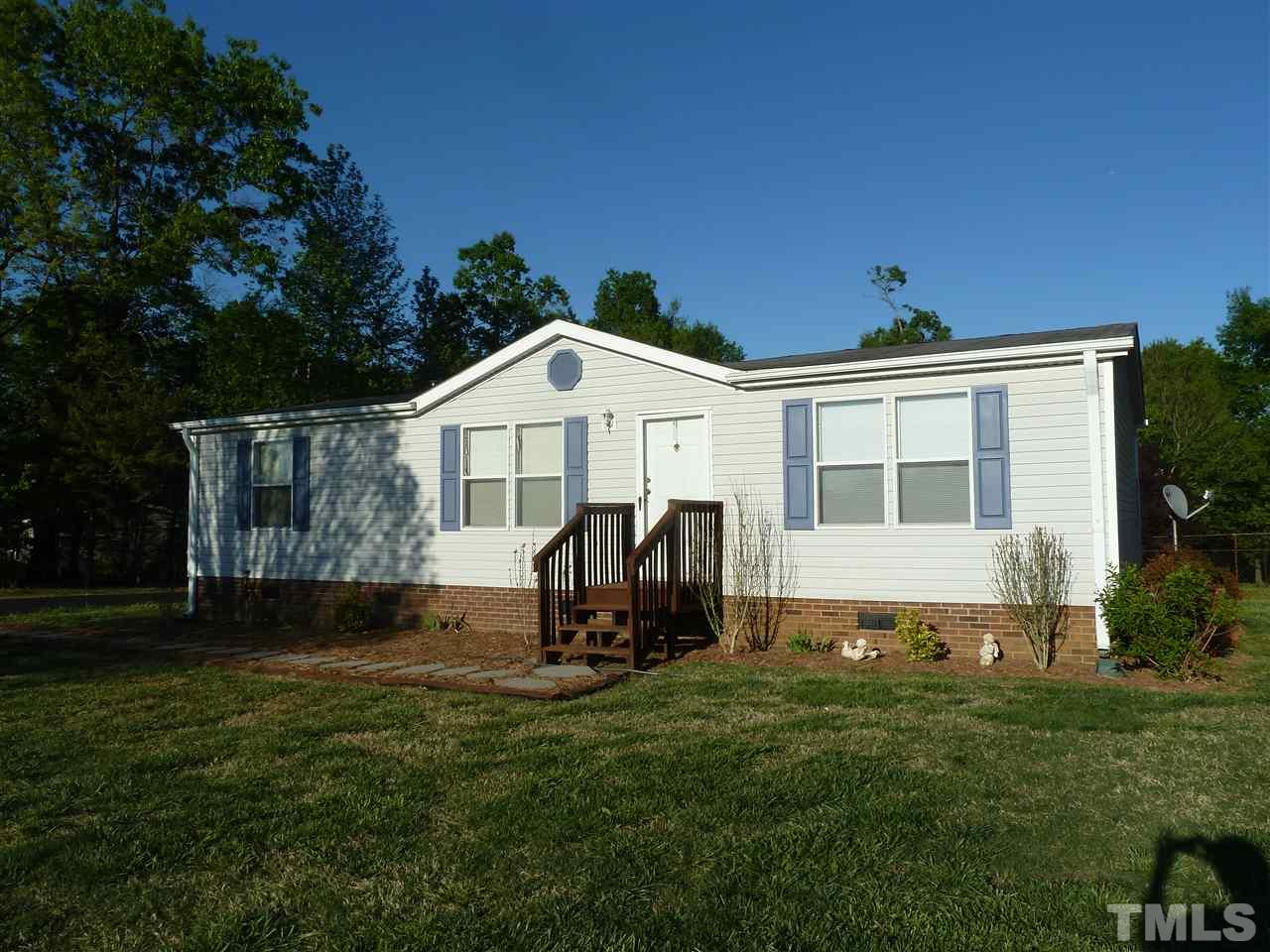 162 Isaac Trail Roxboro, NC 27574 - Photo 1 of 20 a front view of a house with a yard