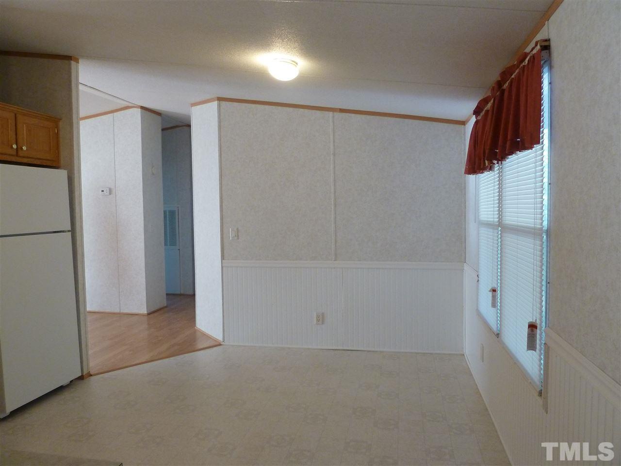 162 Isaac Trail Roxboro, NC 27574 - Photo 12 of 20 a view of an empty room