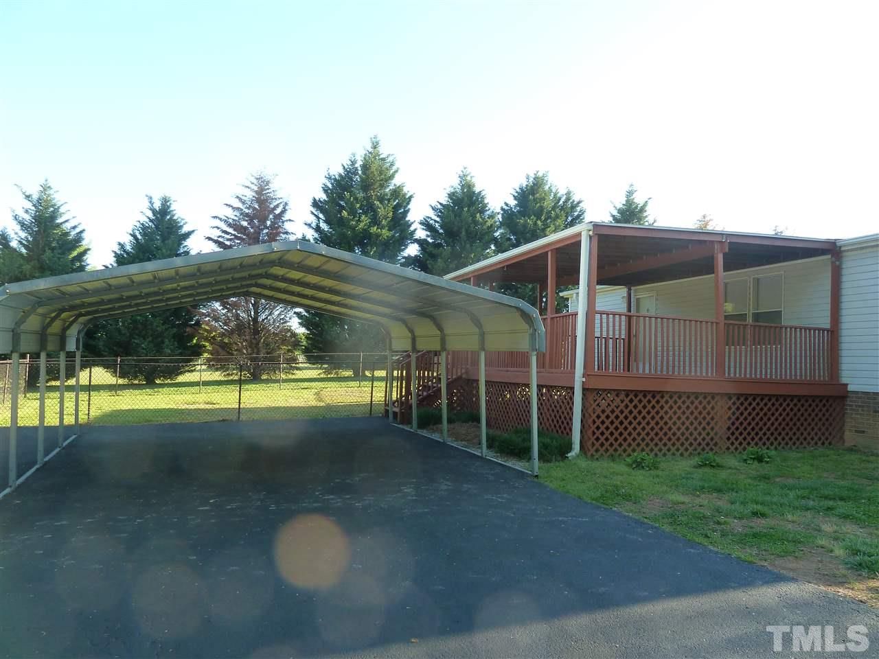 162 Isaac Trail Roxboro, NC 27574 - Photo 7 of 20 a view of backyard with swimming pool and outdoor seating