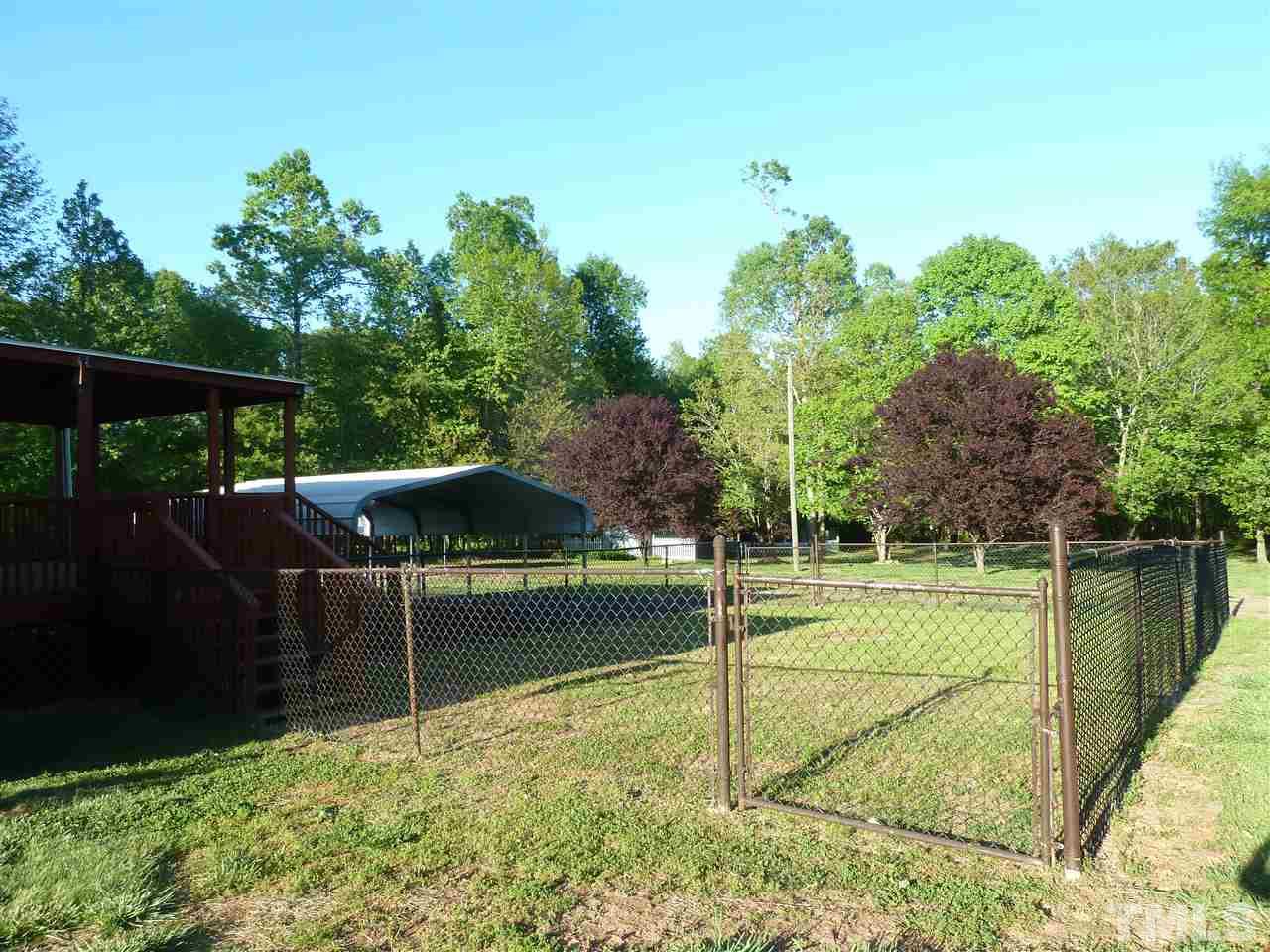 162 Isaac Trail Roxboro, NC 27574 - Photo 8 of 20 a view of a backyard