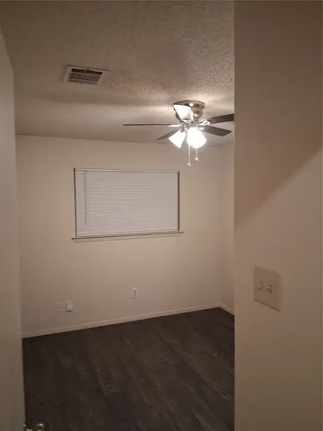 a view of a room with a fan