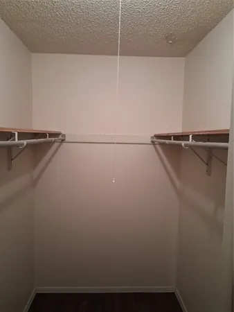 a view of a room with racks on the wall