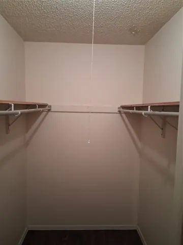 a view of a room with racks on the wall