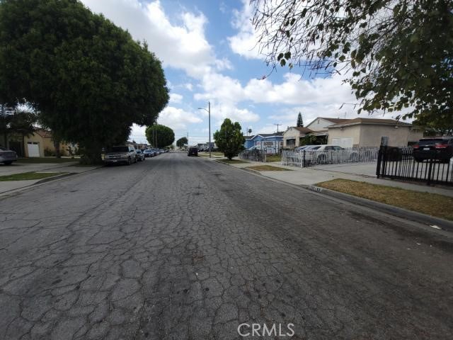 1307 South Grandee Avenue Compton, CA 90220 - Photo 7 of 8 a view of a house with a yard