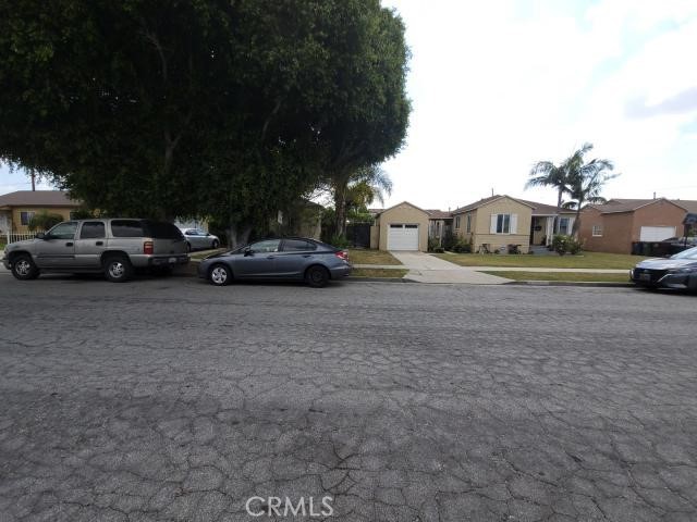 1307 South Grandee Avenue Compton, CA 90220 - Photo 8 of 8 a view of street with parked cars