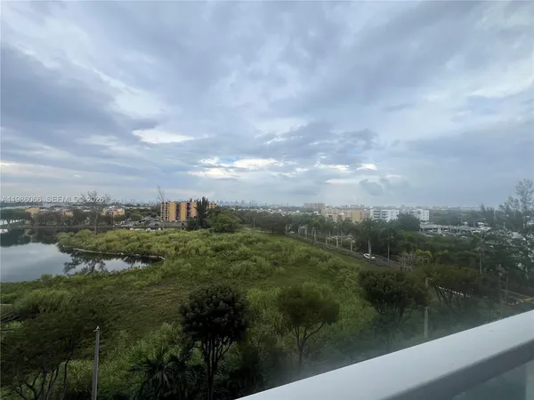 a view of a lake from a yard